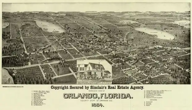 Hand-drawn bird's-eye view map of Orlando in 1884, with a grid of streets, homes, groves and lakes